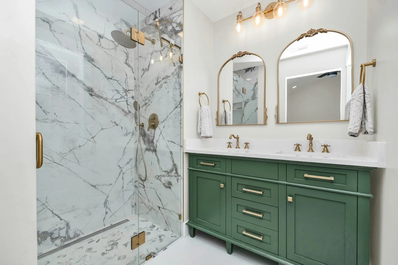 Remodeled bathroom with a tiled walk-in shower